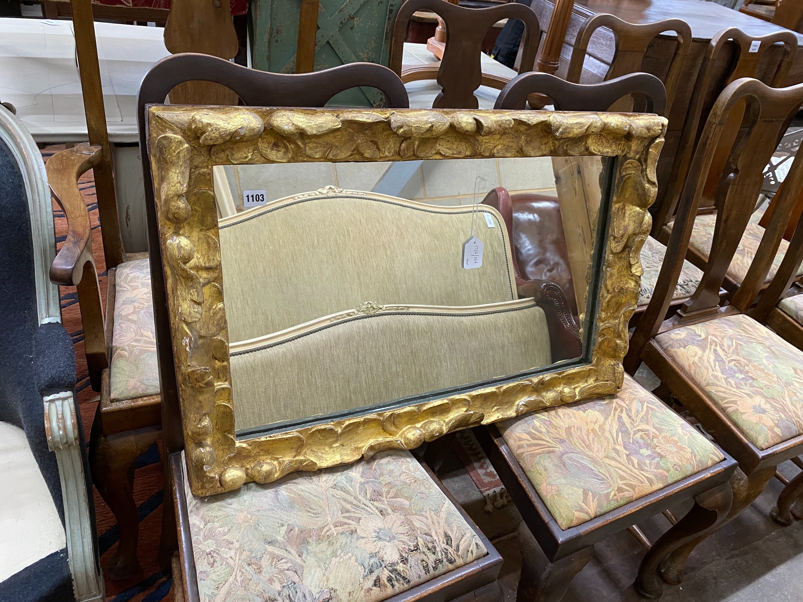 A Florentine style gilt framed rectangular wall mirror, width 86cm, height 56cm